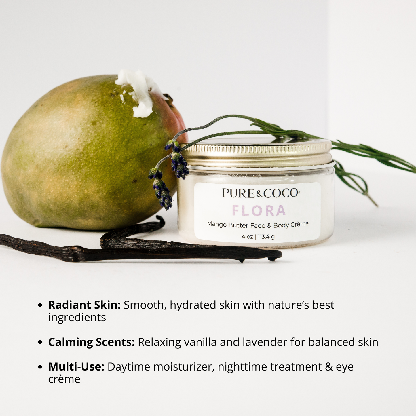 mango sitting next to the jar of the Flora Mango Butter Face & Body Creme_4 oz_Pure and Coco with vanilla and lavender surrounding it