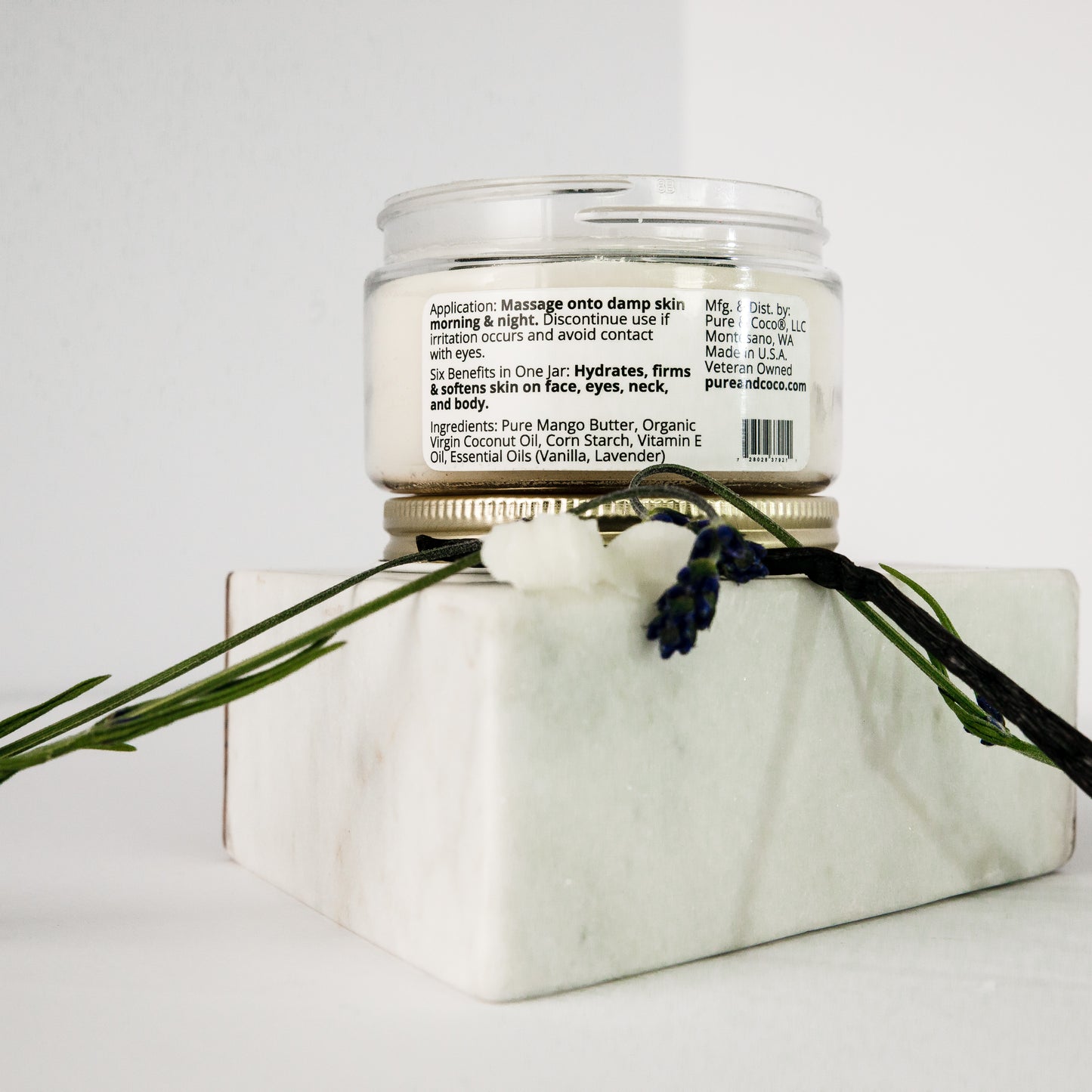 ingredients shown in the Flora Mango Butter Face & Body Creme_4 oz_Pure and Coco