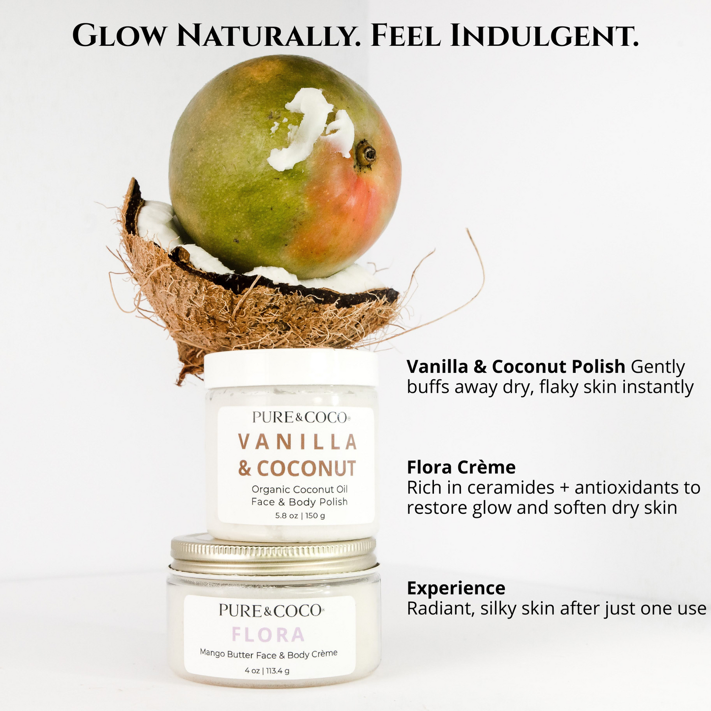 Vanilla and coconut organic coconut oil face and body polish sitting on top of a jar of the Flora mango butter face and body creme by pure and coco with half a coconut and a mango sitting proped ontop creating a tower